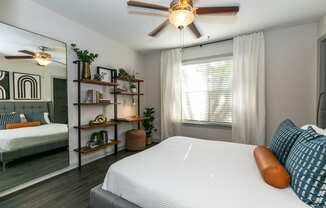 a bedroom with a bed and a ceiling fan at Briarcliff Apartments, Atlanta, GA, 30329