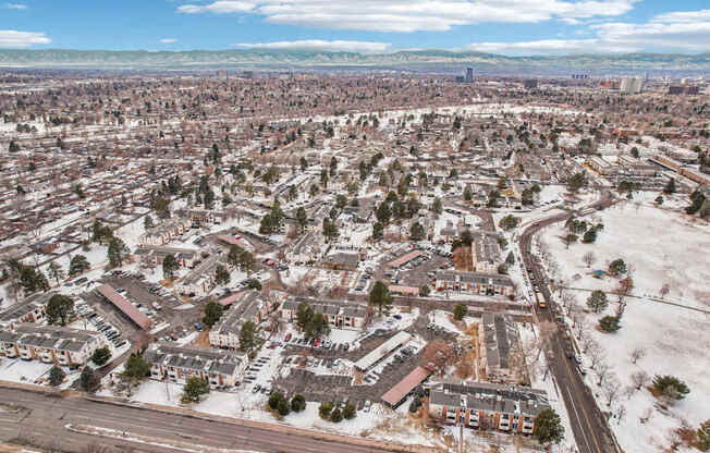 A view of a city from above with buildings and roads.