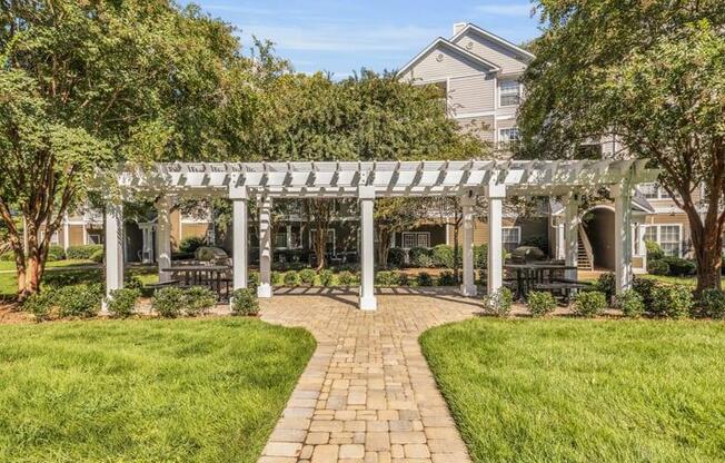 a pathway leading to a house with a pergola at Marina Point, Chattanooga, 37415