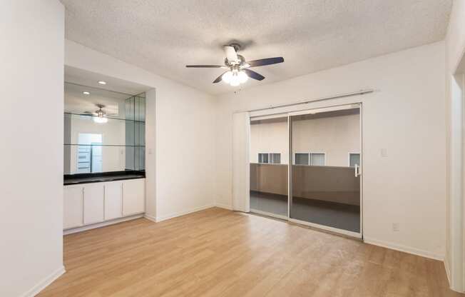 Living Room with Hardwood Floors and Patio Door