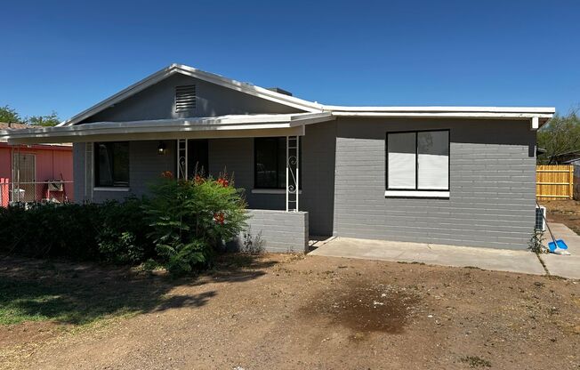 BEAUTIFULLY REMODELED 3 BEDROOM 1.5 BATHROOM HOME WITH A LARGE BACKYARD IN COOLIDGE