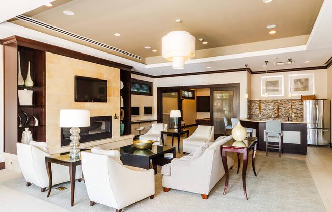 A living room with a fireplace and a television.