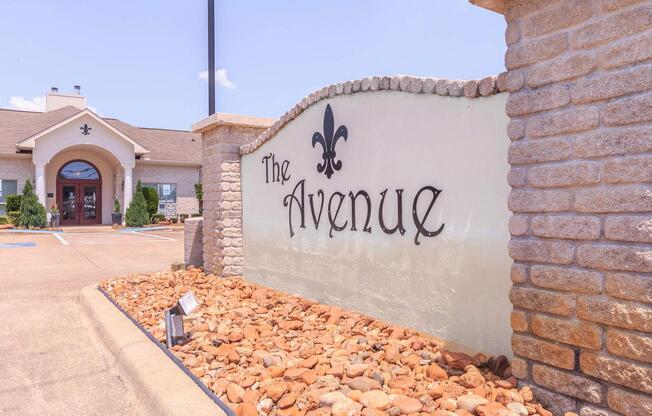 Entrance sign to The Avenue apartments in Nederland, TX