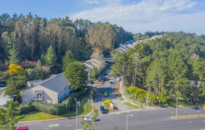 an aerial view of a city street with houses and trees at Skyline Heights LLC, Daly City, CA