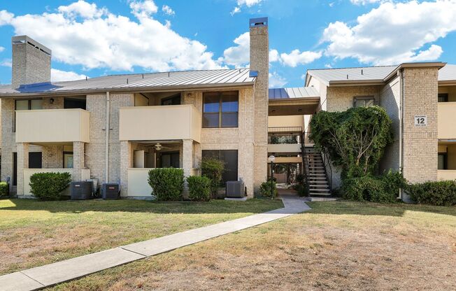 Airy Condo with Fireplace and Balcony in Prime Location