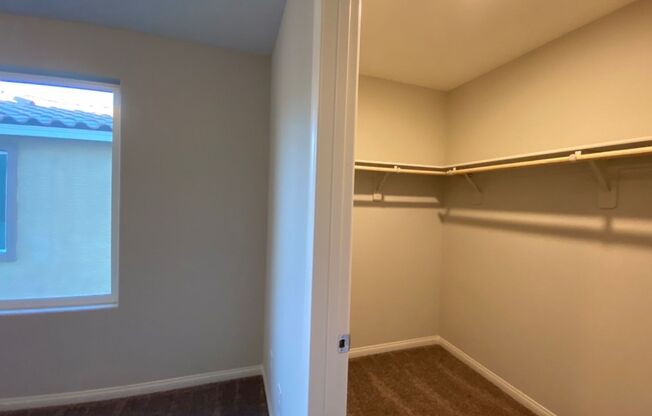 4 BED 2.5 BATH 2 CAR GARAGE,  LARGE CORNER LOT, GATED COMMUNITY IN NORTH VEGAS.