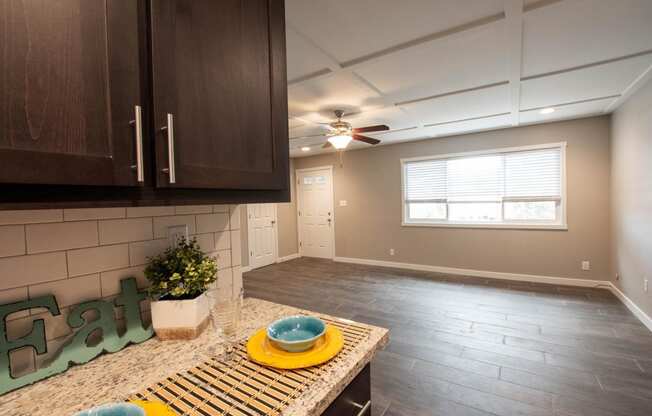 View from kitchen to living room with wood floors