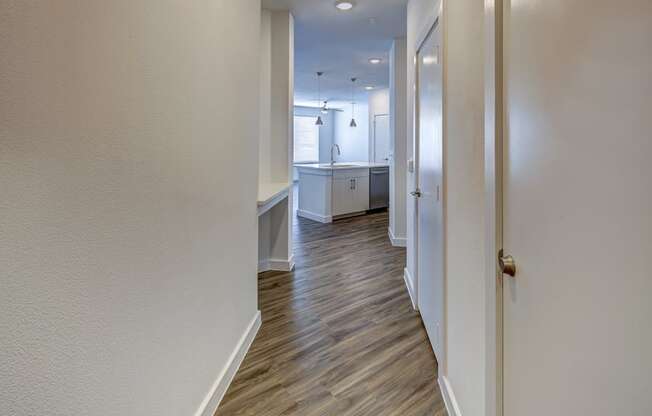 hardwood flooring in. the hallway at Brixton South Shore, Austin, TX