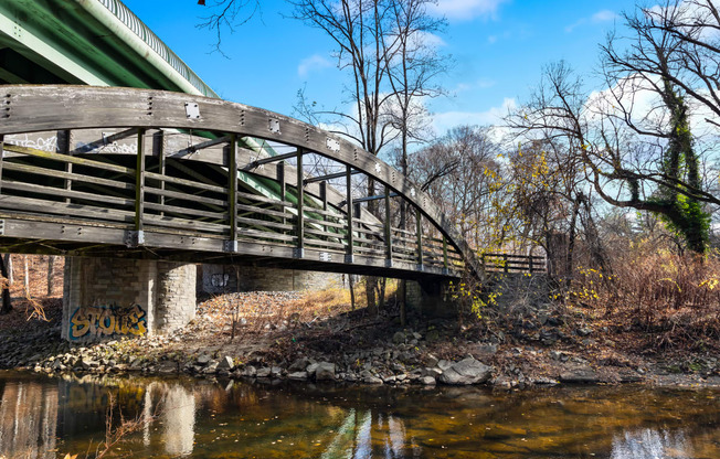 a bridge over a river on a sunny day