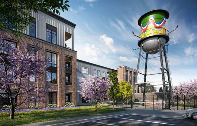 an artist rendering of a water tower in front of a building at Link Apartments® Broad Ave, Tennessee