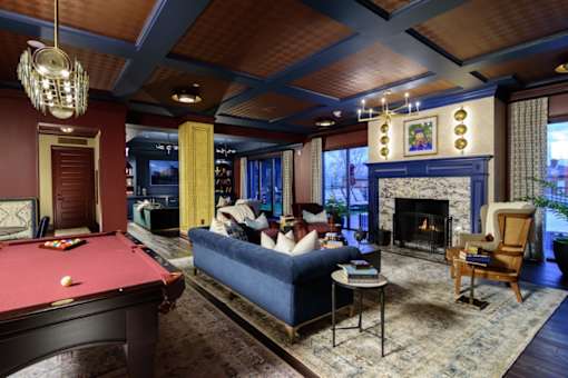 a living room filled with furniture and a pool table at Fairfax, Grandview, OH, 43212