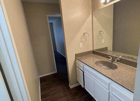 Vanity-sink-and-hallway at ELEVATE, Placentia, CA