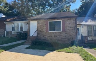 Great Location! Updated Townhouse Conveniently Located To Downtown & Tom Brown Park!