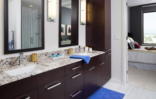 Dual Vanity With Framed Mirrors in Select Apartments at 1000 Speer by Windsor, 1000 Speer Blvd., CO