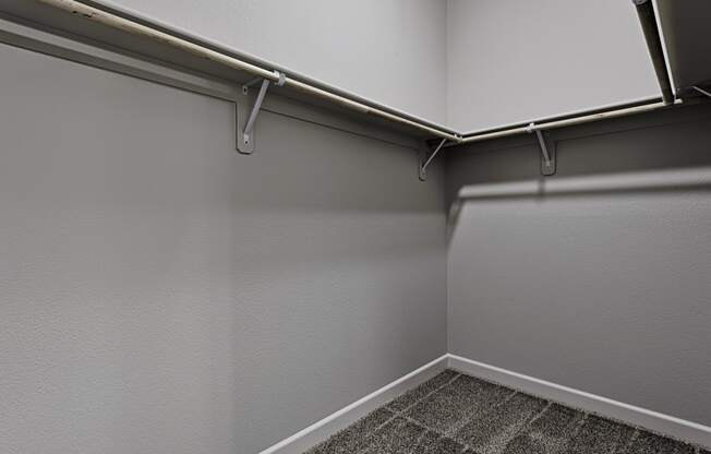 the preserve at ballantyne commons empty storage room with white walls and gray floor