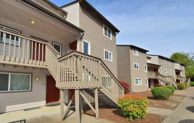 a view of an apartment building with a staircase