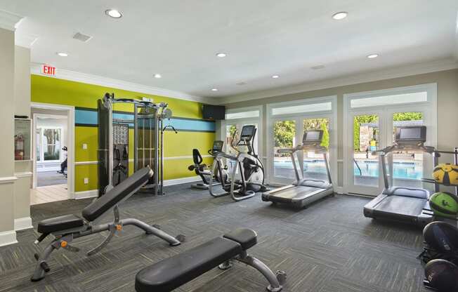 Fitness Center with Cardio Machines located at St. Andrews Apartments in Johns Creek, GA 30022