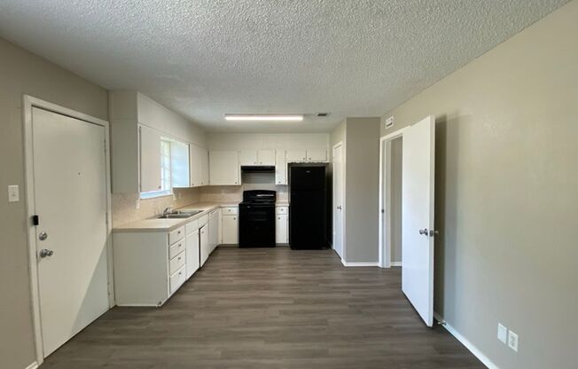 NEWLY UPDATED HOUSE! Spacious 4 bedroom 2 Bath Home!