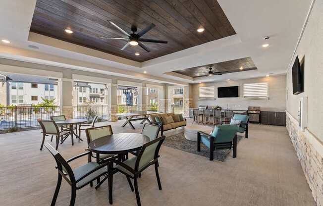 A patio with a table and chairs is shown.