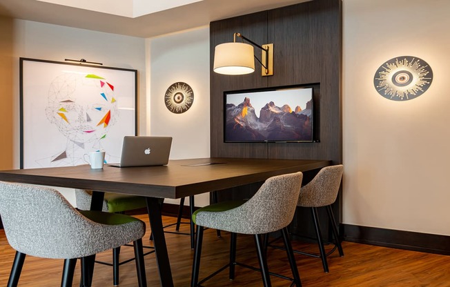 Conference table and TV at The Ridgewood by Windsor, Fairfax, Virginia