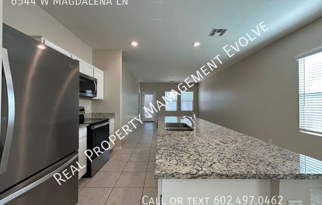 6544 W MAGDALENA LN