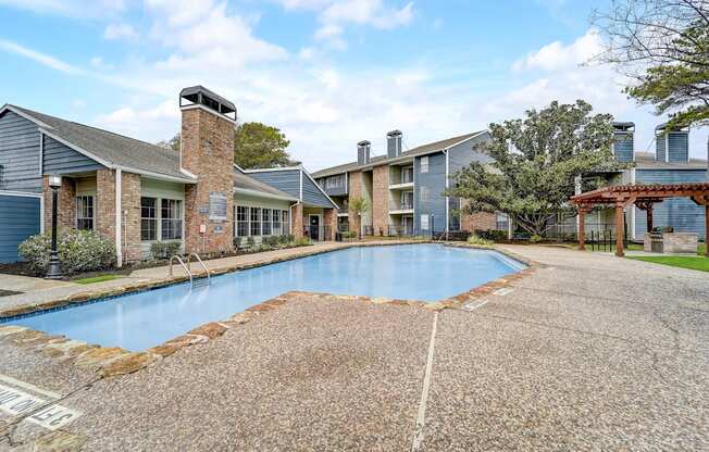the preserve at ballantyne commons pool with apartment buildings