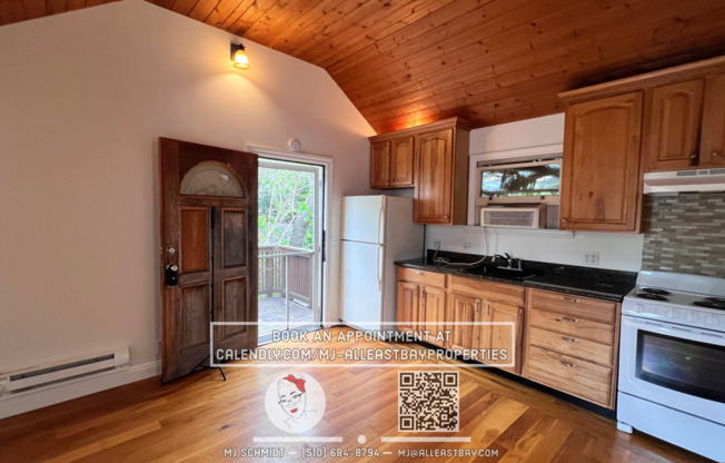 Quaint cottage with hardwood floors, private entrance and patio, surrounded by lush gardens!