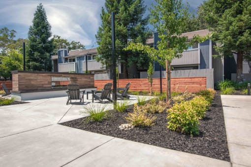 Courtyard with a table and chairs and fireplace