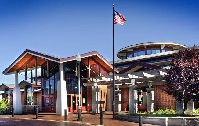 A building with a flag on top of it.