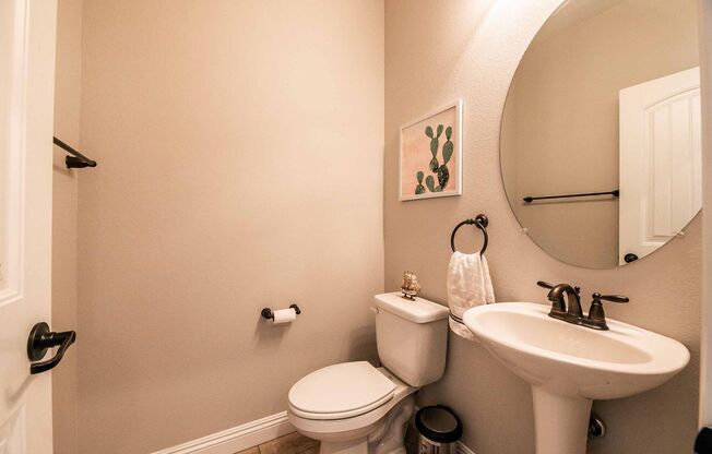 Welcome to this Charming Two-Story Home in the Master-planned Gated Community of Providence!