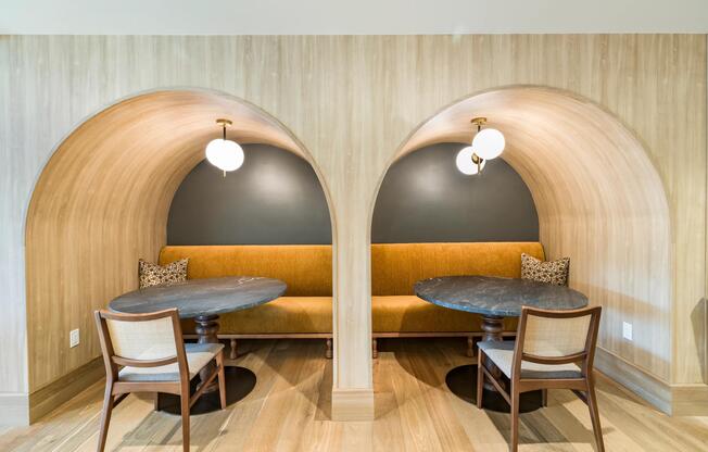 Architectural seating alcoves at Modera University Park, designed for intimate conversations or quiet co-working within the community’s refined shared spaces.