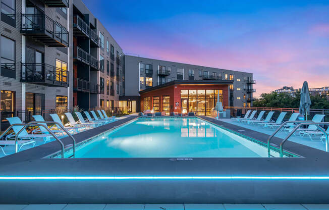 a swimming pool at dusk