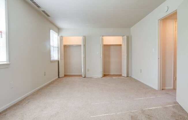 Large bedroom with two large closets with plenty of storage