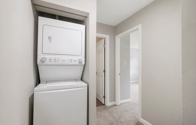 a washer and dryer in a small apartment