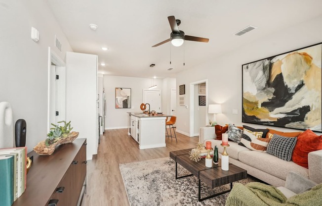 Furnished living room in one bedroom apartment model