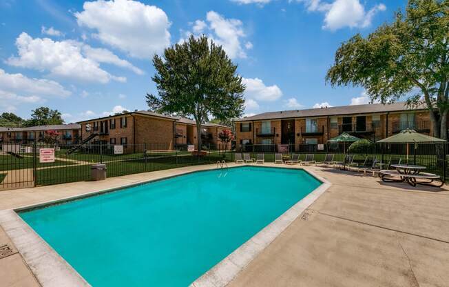 our apartments offer a swimming pool and a courtyard with picnic tables