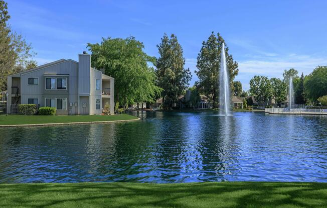 a body of water in front of a house