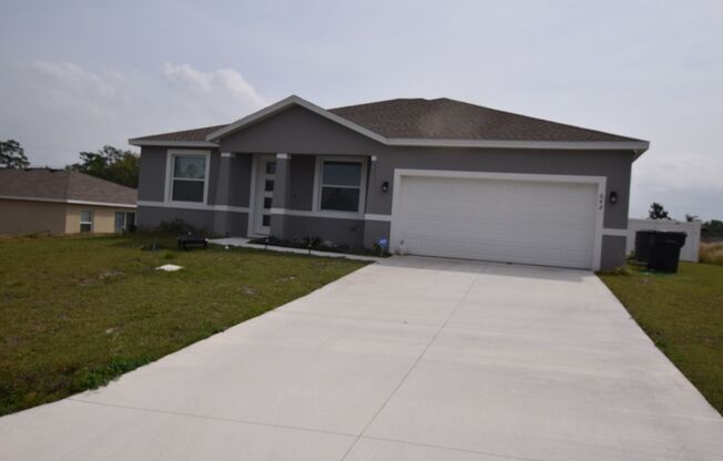 Beautiful 4 bedrooms/ 2.5 baths home with a 2 car garage for rent at 642 Desmoines Ct. Poinciana, FL 34759.