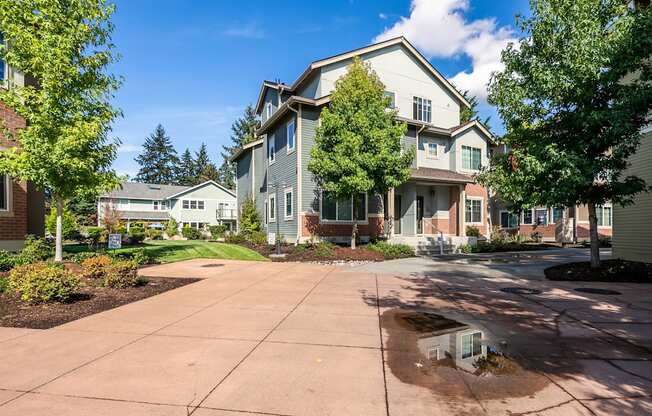 A residential area with houses and trees.