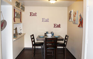 eat words on a wall in a dining room