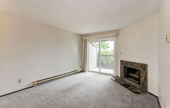 1BD 1BA Single Level Condo + Fireplace + 1 Car Garage + Fitness Center + Tennis Courts + Community Pool