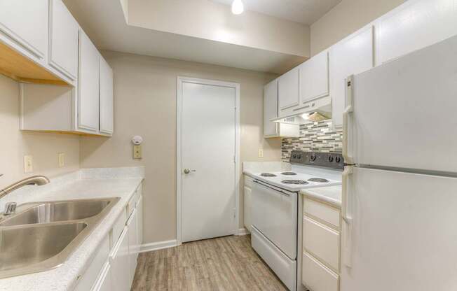 One and two bedroom apartment homes featuring efficient appliances, hardwood floors, walk-in closets, washer and dryer connections and much more at Parham Pointe Apartments in Little Rock, AR