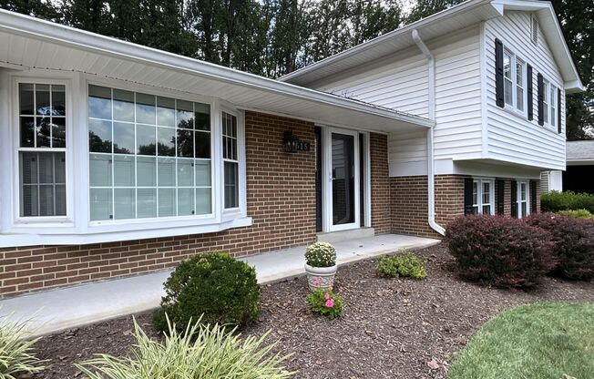 Handsome 5 Bedroom, 2.5 Bath , 4-level Brick Split Level Home Nestled Comfortably in Beautiful Pickett Estates