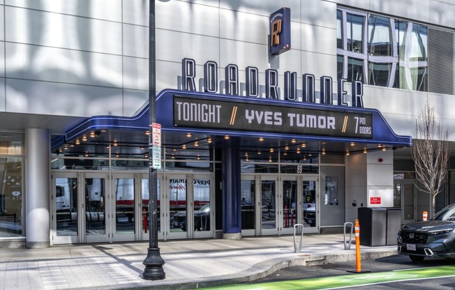 the front of a building with a sign that reads tower vews tunnel 1