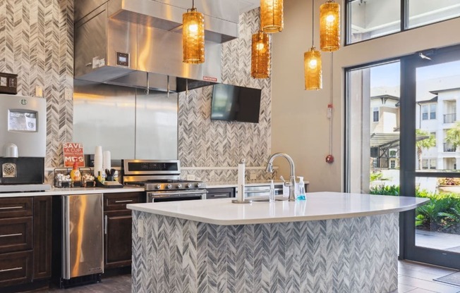 Kitchen with Large Island and Sink at The Loree, Jacksonville, FL, 32256