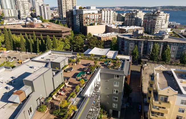 an aerial view of the university of british columbia campus with buildings and trees at Axis, Seattle, 98109