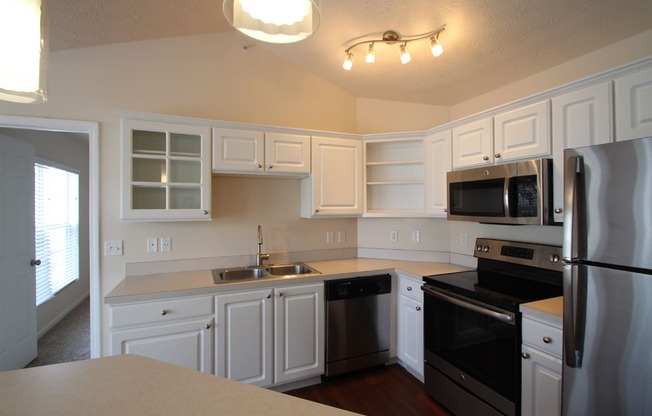 This is a photo of the kitchen area in the 1 bedroom Patriot floor plan at Nantucket Apartments in Loveland, OH.