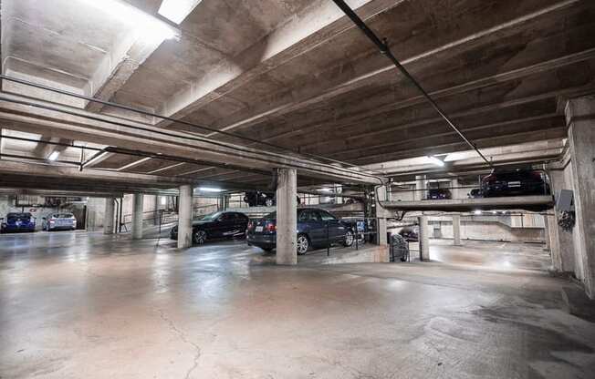 a parking garage with cars in it