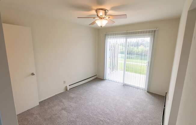 This is a photo of the dining room in the 1004 square foot, 2 bedroom, 1.5 bath townhome floor plan at Lake of the Woods Apartments in Cincinnati, OH.