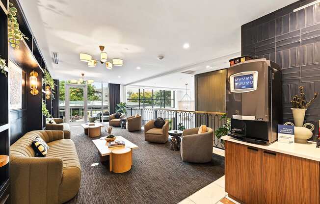 A modern living room with a balcony overlooking the outdoors.